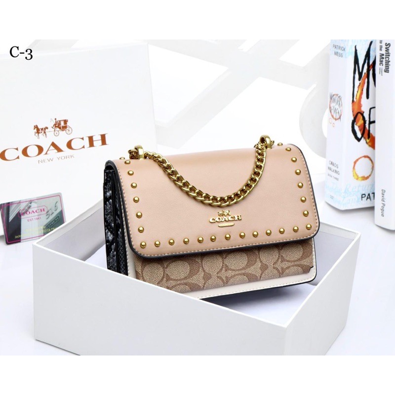 Handtas coach discount